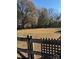 Large backyard with wooden fence and mature trees at 6957 Ray Linker Rd, Concord, NC 28025