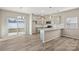 Modern kitchen featuring granite countertops and stainless steel appliances at 8205 Stonemere Ln, Charlotte, NC 28215