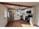 Renovated kitchen, featuring stainless steel appliances and an exposed beam at 1327 Marble St, Charlotte, NC 28208