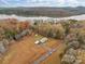 Lakefront property with house and autumn foliage at 170 Stillwater Rd, Richfield, NC 28137