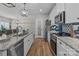 Modern kitchen with granite countertops and stainless steel appliances at 170 Stillwater Rd, Richfield, NC 28137