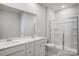 Clean bathroom with double vanity and large shower at 206 Abersham Dr, Mooresville, NC 28115