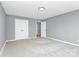 Spacious bedroom with neutral walls and carpet at 208 Pawley Dr, Charlotte, NC 28214