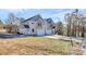 Two-story townhouses with attached garages and wooded views at 208 Pawley Dr, Charlotte, NC 28214