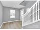 Bright foyer with hardwood floors and a staircase at 208 Pawley Dr, Charlotte, NC 28214