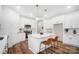 Modern kitchen with white cabinets and a kitchen island at 2410 Forrestbrook Dr, Kannapolis, NC 28083