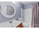 Bathroom with a shower, tub, and a vanity at 244 Whisper Dr, China Grove, NC 28023