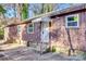 Ranch home with wood siding, steps, and a small front yard at 260 Amelia Dr, Fort Mill, SC 29715