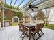 Relaxing patio area with table and chairs under a pergola at 2711 Rozzelles Landing Dr, Charlotte, NC 28214