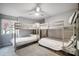 Bedroom with two built-in bunk beds, window, and carpeted floor at 3795 Deer Run, Denver, NC 28037