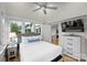 Bright bedroom with a queen bed and access to a balcony at 3795 Deer Run, Denver, NC 28037