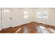 Bright living room with hardwood floors and neutral walls at 678 Wagner St, Troutman, NC 28166