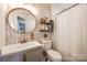 Bathroom with updated vanity and walk-in shower at 11621 Clear Day Ct, Charlotte, NC 28269