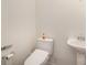 Clean bathroom with a toilet and sink at 13919 Highland Meadow Rd, Charlotte, NC 28273