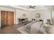 Main bedroom with wood accent wall and seating area at 13919 Highland Meadow Rd, Charlotte, NC 28273