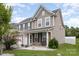 Two-story house with neutral siding, two-car garage, and landscaping at 13919 Highland Meadow Rd, Charlotte, NC 28273