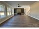 Spacious living area with hardwood floors and large windows at 1875 Rock Hill Church Rd # 4, Matthews, NC 28104