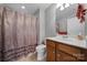 Clean bathroom with shower/tub combo and wood vanity at 2123 Hartwell Ln, Fort Mill, SC 29707