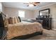 Spacious bedroom with a king-size bed and dark wood dresser at 216 Delview Dr, Cherryville, NC 28021