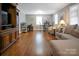 Living room with hardwood floors, and a built-in entertainment center at 216 Delview Dr, Cherryville, NC 28021