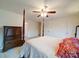 Calm bedroom with a post bed and ensuite access at 230 Primrose Dr, Stony Point, NC 28678