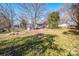 Large backyard with shed and trees at 241 4Th N Ave, Taylorsville, NC 28681