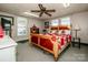 Bedroom with a large wooden bed frame and red and white bedding at 241 4Th N Ave, Taylorsville, NC 28681