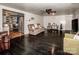 Spacious living room with dark hardwood floors and a view of the kitchen at 241 4Th N Ave, Taylorsville, NC 28681