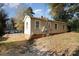 Side view of house with yard and driveway at 2630 Druid Hills Way, Charlotte, NC 28206