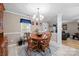 Open concept dining room with view into the kitchen at 4395 Pine Harbor Dr, Denver, NC 28037