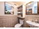 Small bathroom with pedestal sink and shower at 741 Bible Camp Ln, Taylorsville, NC 28681