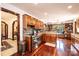 Spacious kitchen with stainless steel appliances and hardwood floors at 741 Bible Camp Ln, Taylorsville, NC 28681