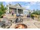 Fire pit and lounge chairs on a spacious patio at 112 Sisters Cove Ct, Mooresville, NC 28117