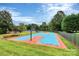 Community basketball court with blue and red surface at 1282 Branson Nw Rd, Concord, NC 28027