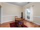 Small dining area with hardwood floors and a round table with chairs at 14813 Latour Ct, Pineville, NC 28134