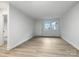 Spacious living room featuring hardwood floors and large windows at 1908 Dickens Ave, Charlotte, NC 28208