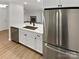 Modern kitchen with stainless steel appliances and white cabinetry at 5003 Sharon Rd # S, Charlotte, NC 28210