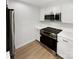 Updated kitchen, stainless steel appliances, and white cabinets at 5003 Sharon Rd # S, Charlotte, NC 28210