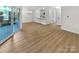 Open concept living space with hardwood floors and natural light at 5003 Sharon Rd # S, Charlotte, NC 28210