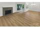 Spacious living area with hardwood floors and fireplace at 5003 Sharon Rd # S, Charlotte, NC 28210