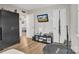 Bedroom with black furniture, a mini trampoline, and a wall-mounted TV at 5110 Darby Dr, Monroe, NC 28110