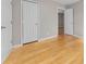 Hardwood floor bedroom with ample closet space and an additional doorway at 624 Flint St, Rock Hill, SC 29730