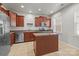 Kitchen boasts stainless steel appliances and an island at 7111 Brighton Park Dr, Mint Hill, NC 28227