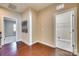 Upstairs hallway with access to laundry and bedrooms at 9528 Gladden Hill Ln, Pineville, NC 28134