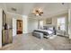 Bright main bedroom with plush carpet and large windows at 9528 Gladden Hill Ln, Pineville, NC 28134