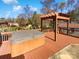 Relaxing hot tub on a spacious deck with pergola at 104 Abingdon Cir, Huntersville, NC 28078