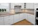 Kitchen with granite countertops and white cabinets at 104 Abingdon Cir, Huntersville, NC 28078