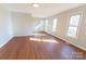 Bright living room with hardwood floors and neutral walls at 1250 Zeb Haynes Rd, Maiden, NC 28650