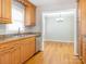 Kitchen with stainless steel appliances and light wood cabinets at 1511 Anthony Dr, Gastonia, NC 28052