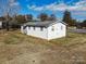 View of the side and back of a white ranch home at 1709 W Highway 27 Hwy, Lincolnton, NC 28092